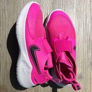 Nike Pink and Black Sneakers with Bold Design